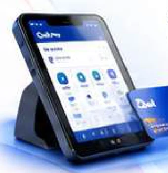 Quik SmartPOS tablet terminal on a stand beside a contactless card